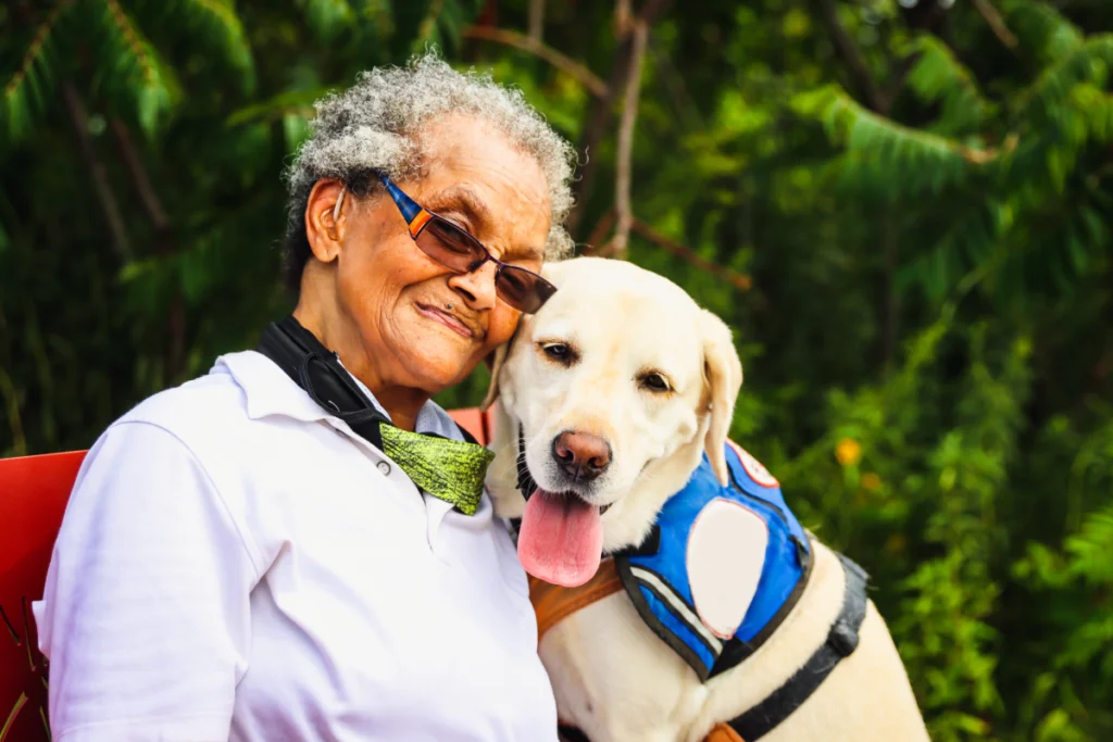 an old lady with her support dog